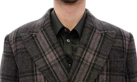 Gray double-breasted coat jacket by Dolce & Gabbana, shown on a hanger with detailed lapels and classic tailored fit.