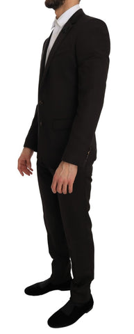 Close-up of a brown wool crystal bee slim fit martini blazer by Dolce & Gabbana showing detailed embroidery and tailored fit.