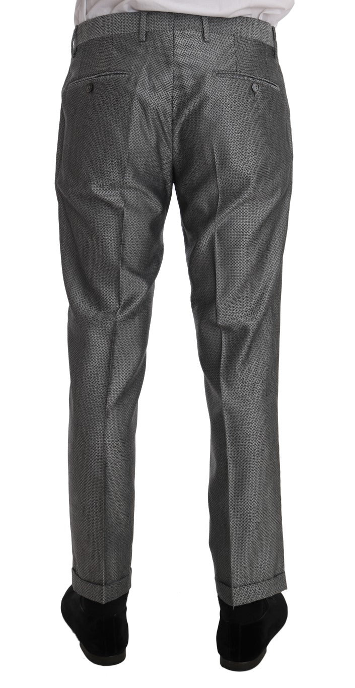 Black stretch crystal bee slim fit suit by Dolce & Gabbana, tailored with crystal embellishments, shown on a mannequin.