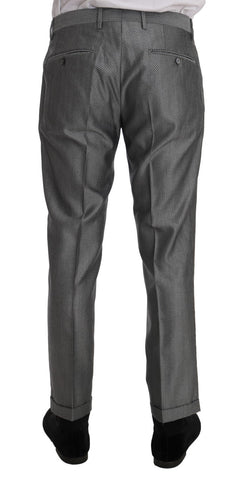 Black stretch crystal bee slim fit suit by Dolce & Gabbana, tailored with crystal embellishments, shown on a mannequin.