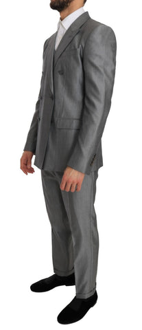 Black stretch crystal bee slim fit suit by Dolce & Gabbana, tailored with sleek fabric and intricate crystal bee embroidery.