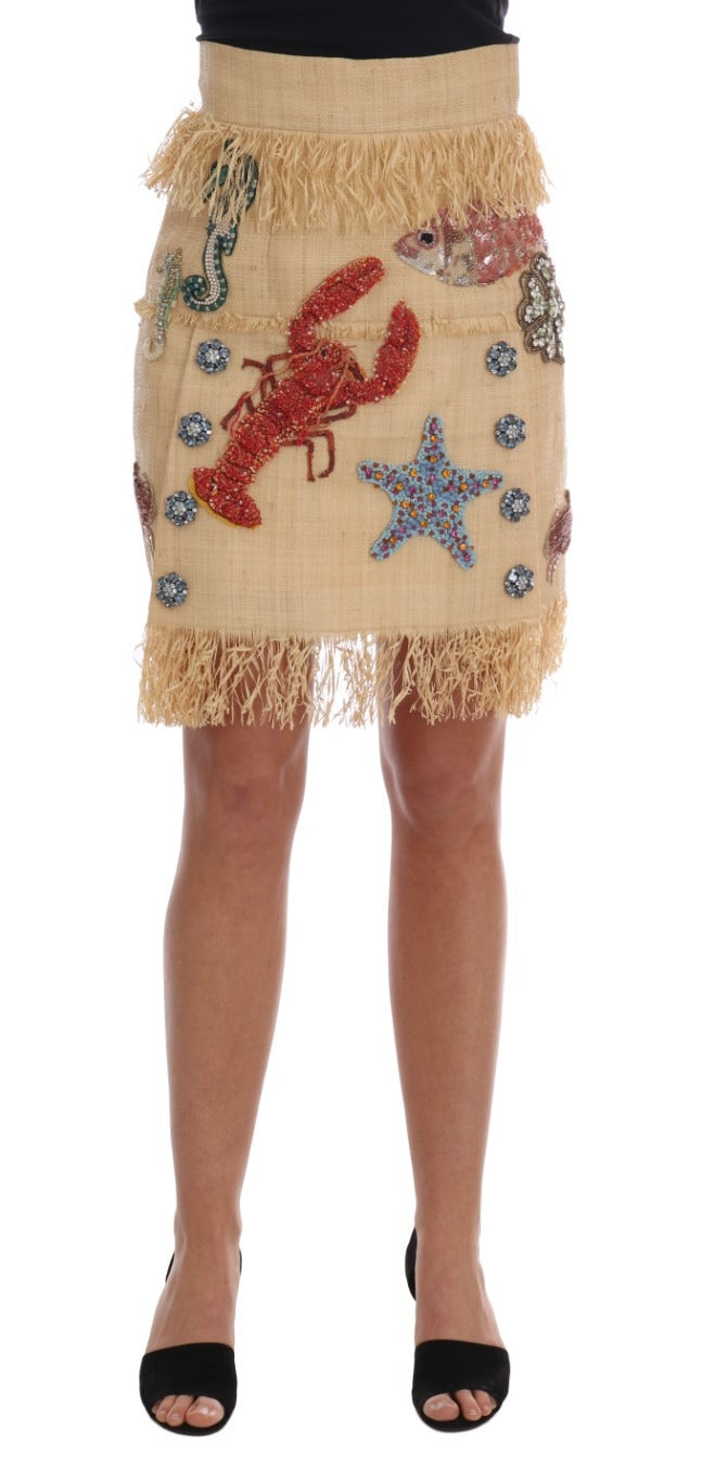 Crystal beige palm fiber skirt by Dolce & Gabbana displayed on a model, showcasing its textured, elegant design and natural tone.
