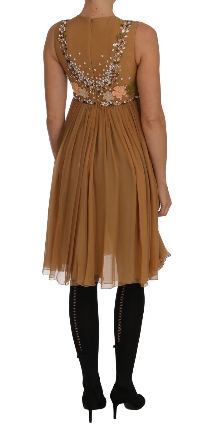 Elegant Crystal Silk Gold A-Line Gown Dress by Dolce & Gabbana with intricate detailing and flowing fabric.