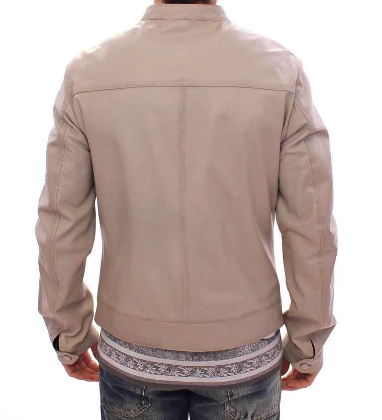 Beige leather biker jacket from Dolce & Gabbana, featuring classic design and stylish stitching details.