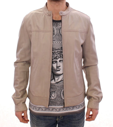 Beige leather biker jacket by Dolce & Gabbana, stylish coat with metal zipper details and classic collar, front view.