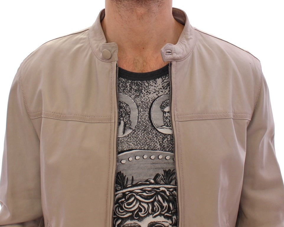 Beige leather biker jacket from Dolce & Gabbana, featuring classic design with metal zipper details and stylish collar.