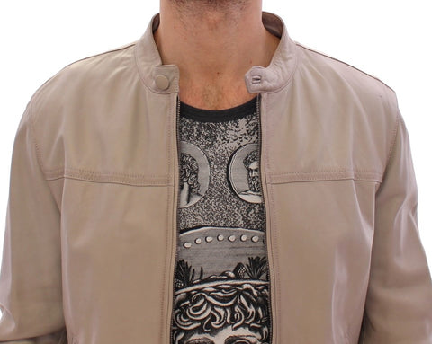 Beige leather biker jacket from Dolce & Gabbana, featuring classic design with metal zipper details and stylish collar.