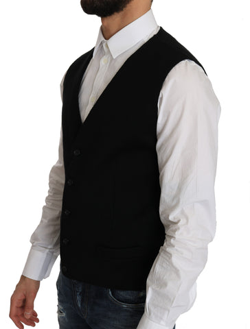 Black cotton dress with woven waistcoat by Dolce & Gabbana, featuring a stylish and elegant design, shown on a model.