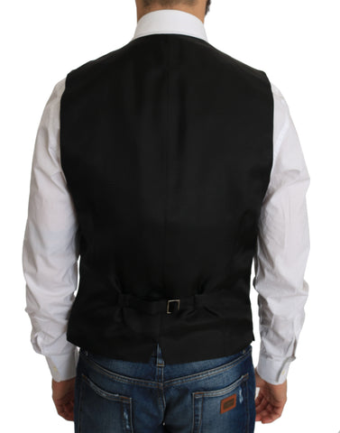 Black silk dress waistcoat by Dolce & Gabbana, tailored fit with sleek fabric and stylish design, shown on a mannequin.