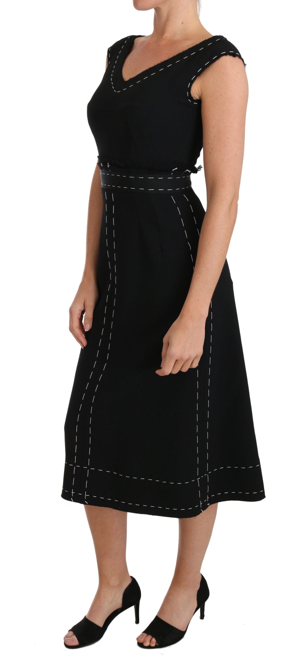 Black wool stretch A-line sheath dress by Dolce & Gabbana, featuring a fitted silhouette and elegant design.