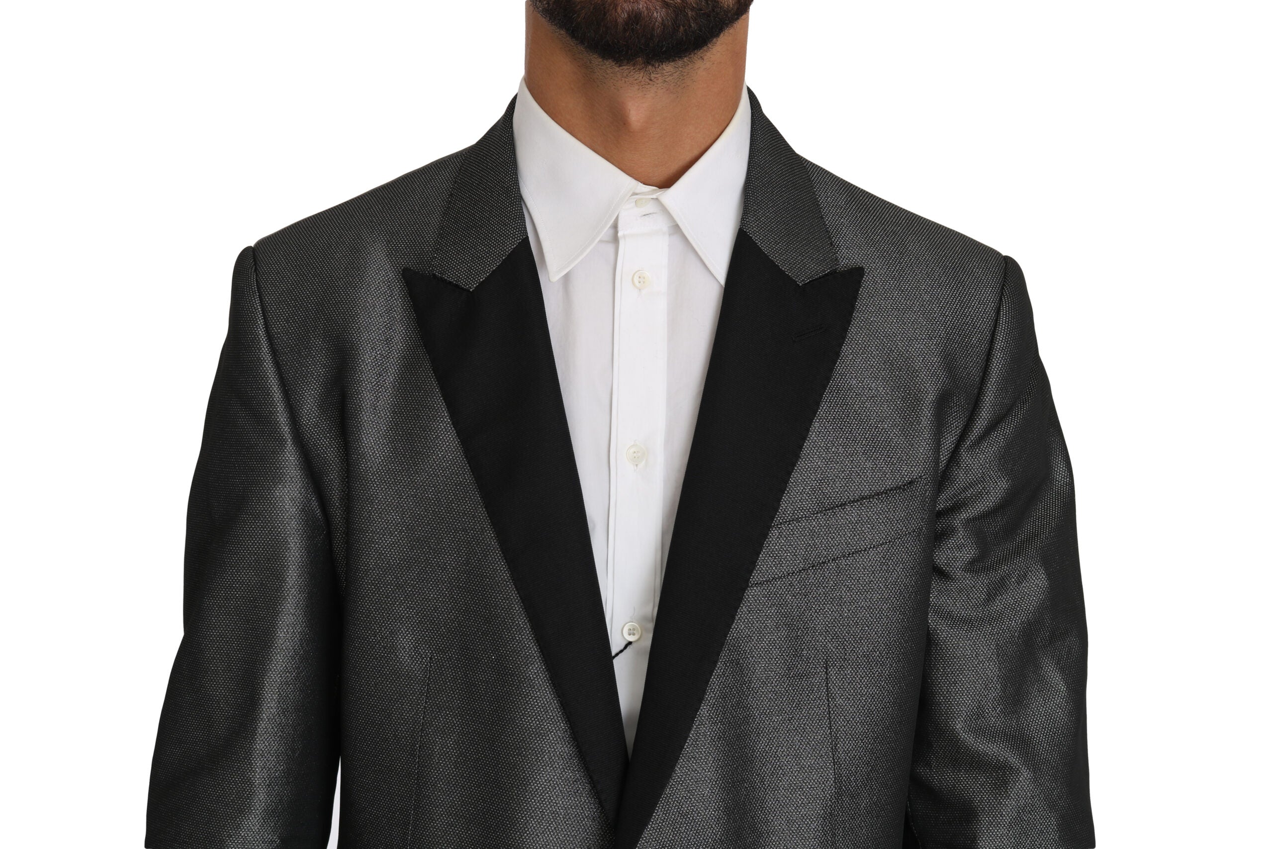 Gray patterned Martini 2-piece suit by Dolce & Gabbana, featuring tailored jacket and matching trousers on a hanger.
