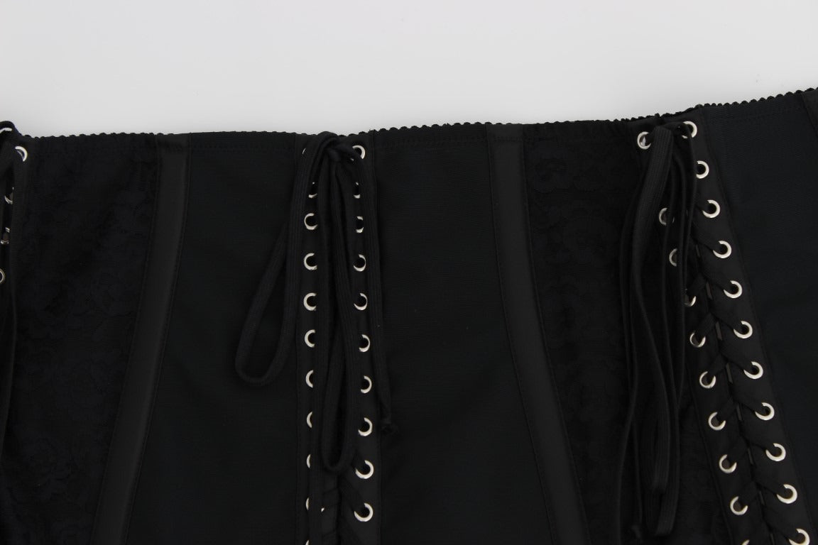Black stretch corset waist strap belt by Dolce & Gabbana, featuring a fitted design with adjustable straps and a sleek finish.