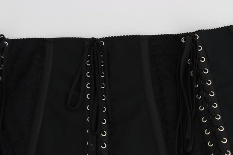 Black stretch corset waist strap belt by Dolce & Gabbana, featuring a fitted design with adjustable straps and a sleek finish.