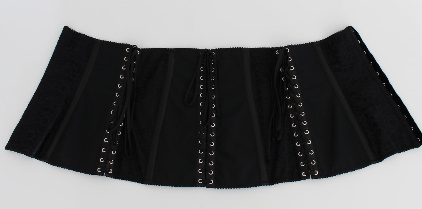 Black stretch corset waist strap belt by Dolce & Gabbana shown on a white background