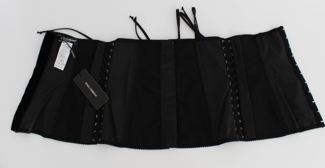 Black stretch corset waist strap belt from Dolce & Gabbana with adjustable fit and sleek design, showcased on a neutral background.
