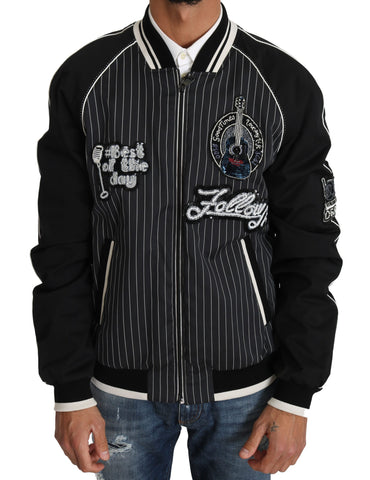 Black sequined beaded jacket by Dolce & Gabbana, featuring intricate detailing and luxurious fabric with a tailored fit.