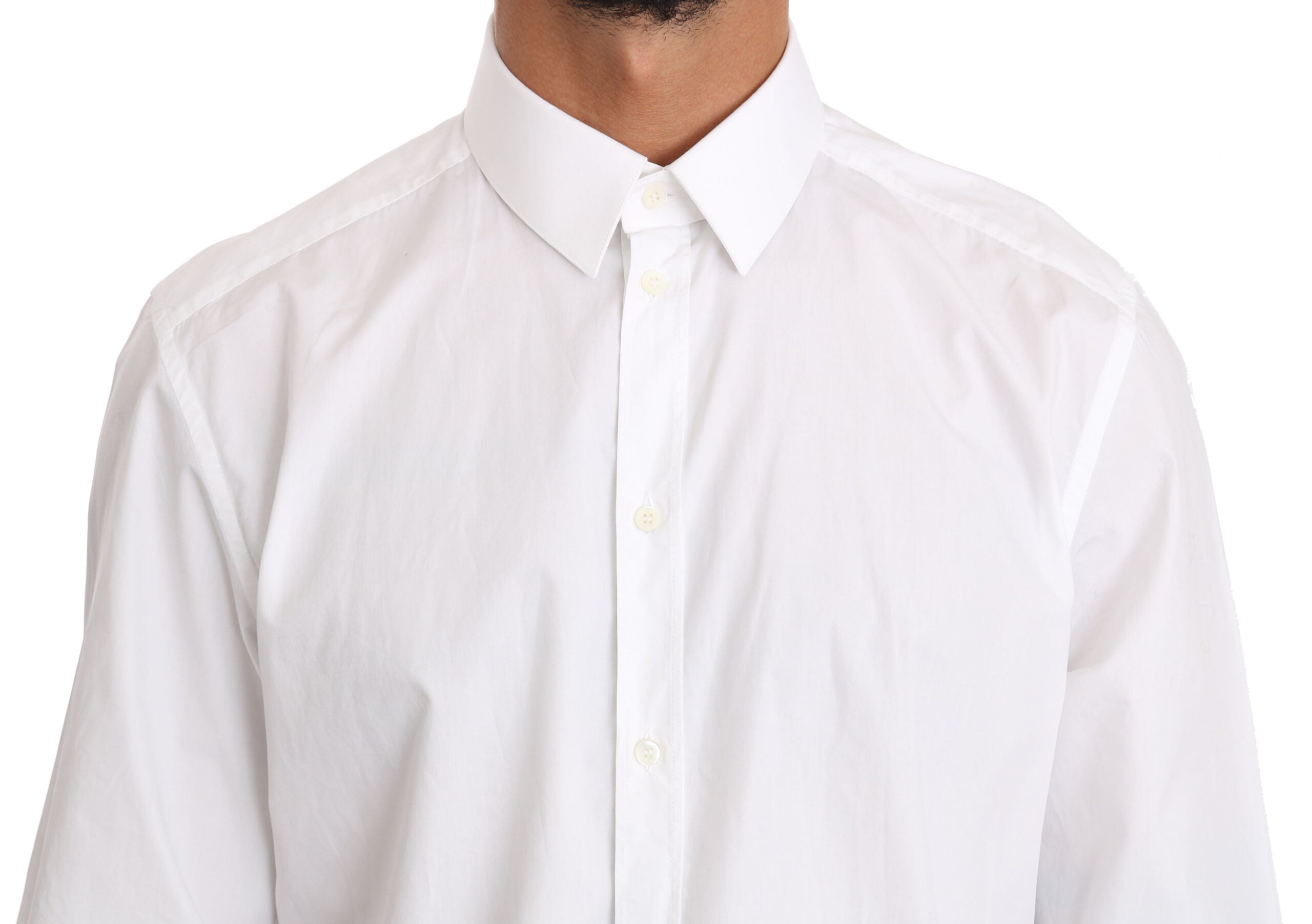 White cotton dress shirt by Dolce & Gabbana featuring a classic fit and gold accents, displayed on a hanger.