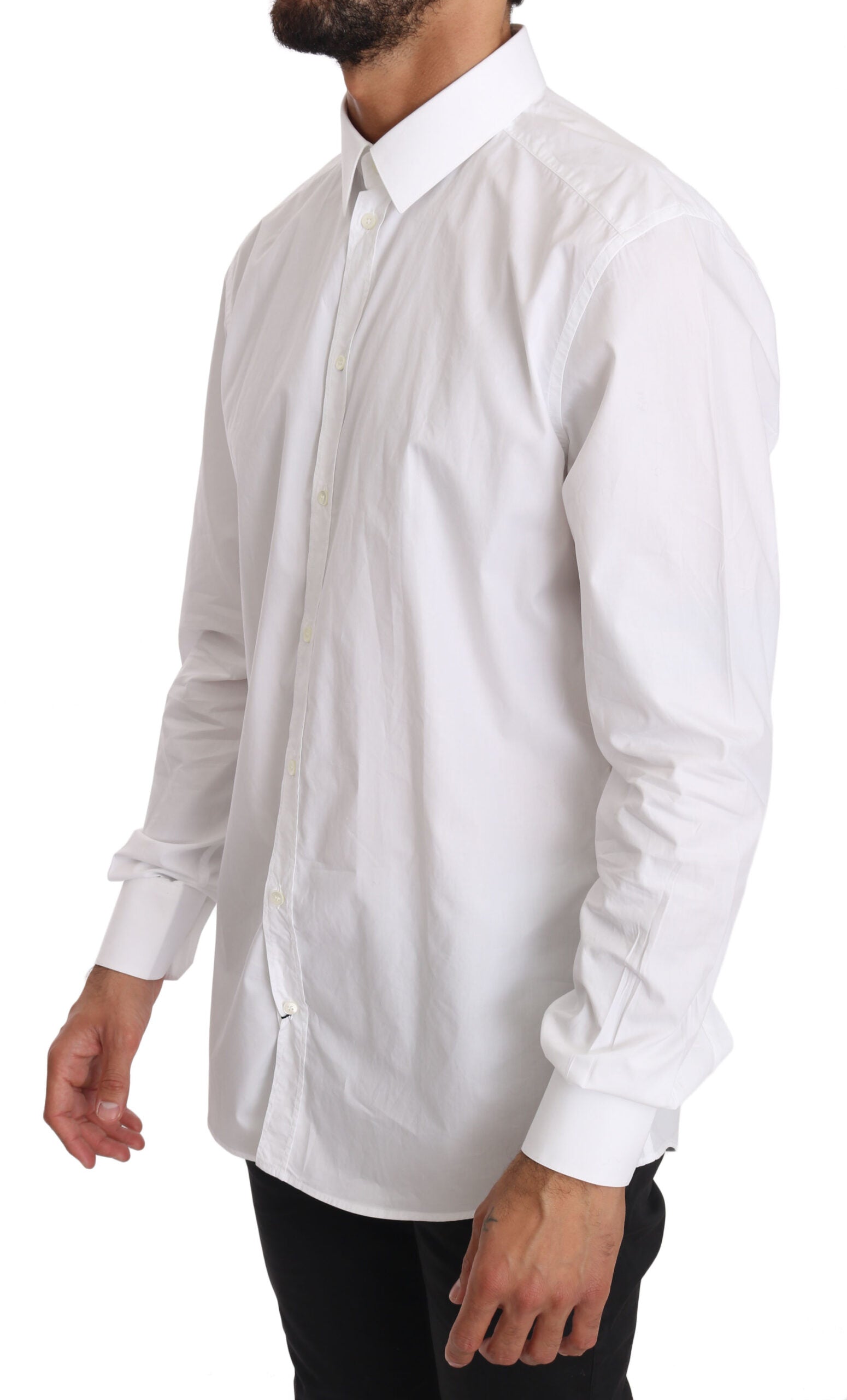 White cotton dress shirt by Dolce & Gabbana featuring a classic fit and gold accents, displayed on a hanger.