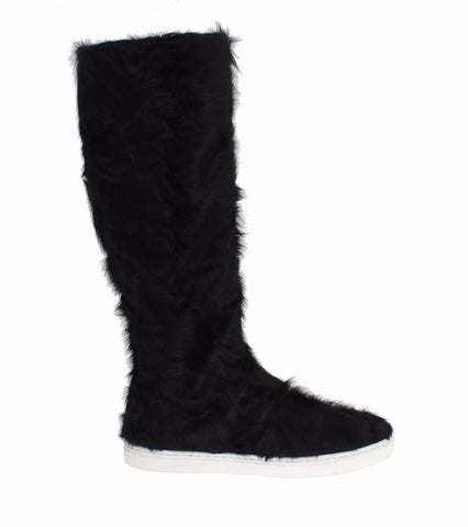 Black Xiangao lamb fur leather boots by Dolce & Gabbana, showcasing stylish high-top design with fur accents and sleek leather finish.