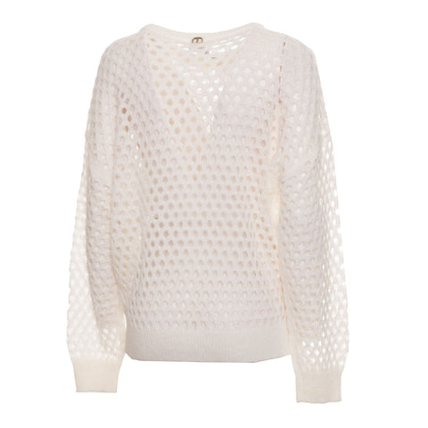 Twinset by Jag Couture London-New York featuring a stylish knit sweater with a modern pattern and ruffled details.