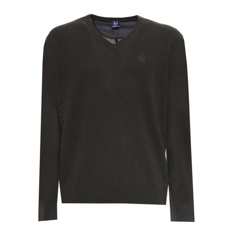 Dark green Sergio Tacchini athletic jacket with logo detail, displayed on a hanger against a white background.