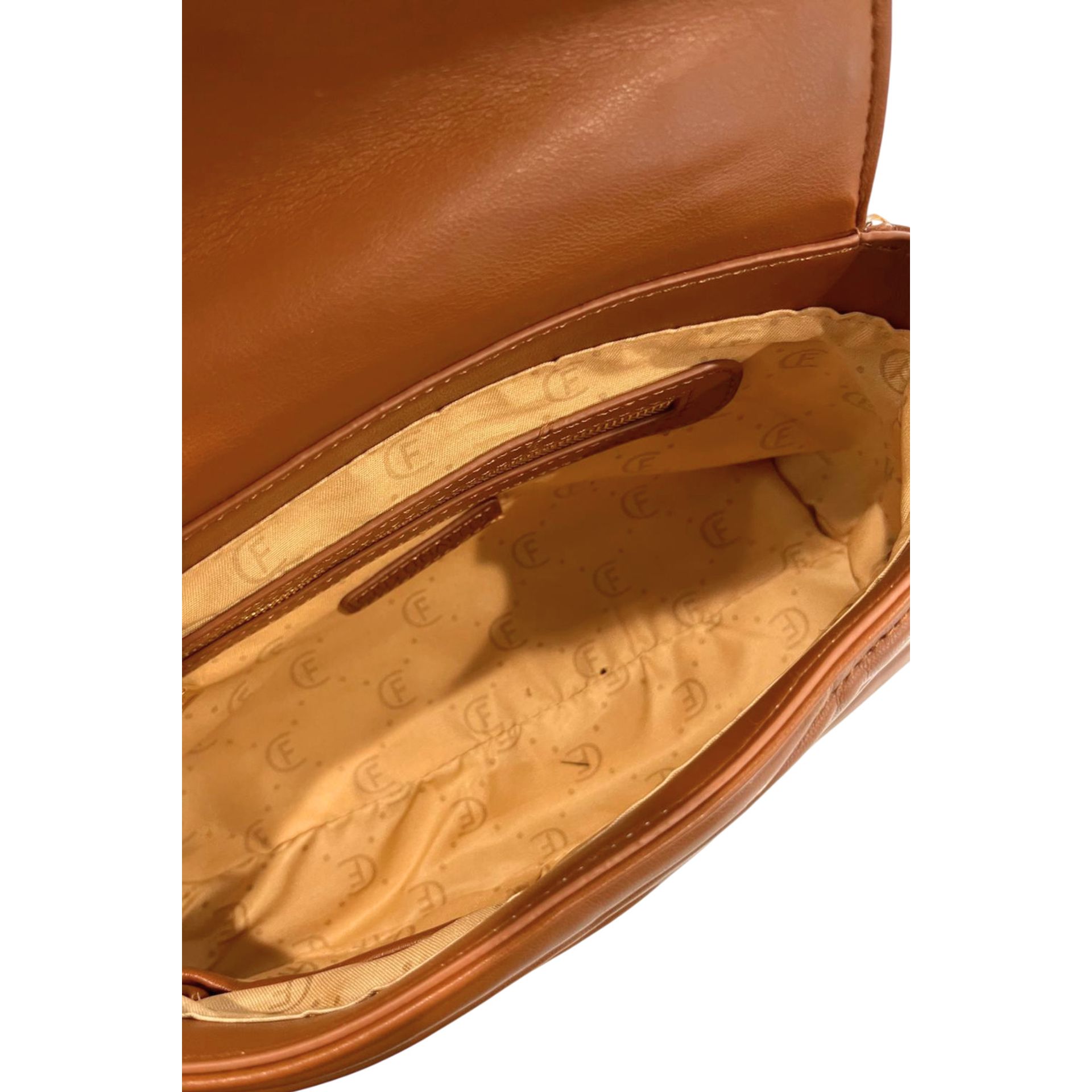 Cristinaeffe CF24FW026_CUOIO handbag by Jag Couture London - New York, featuring a sleek leather design with metal accents.