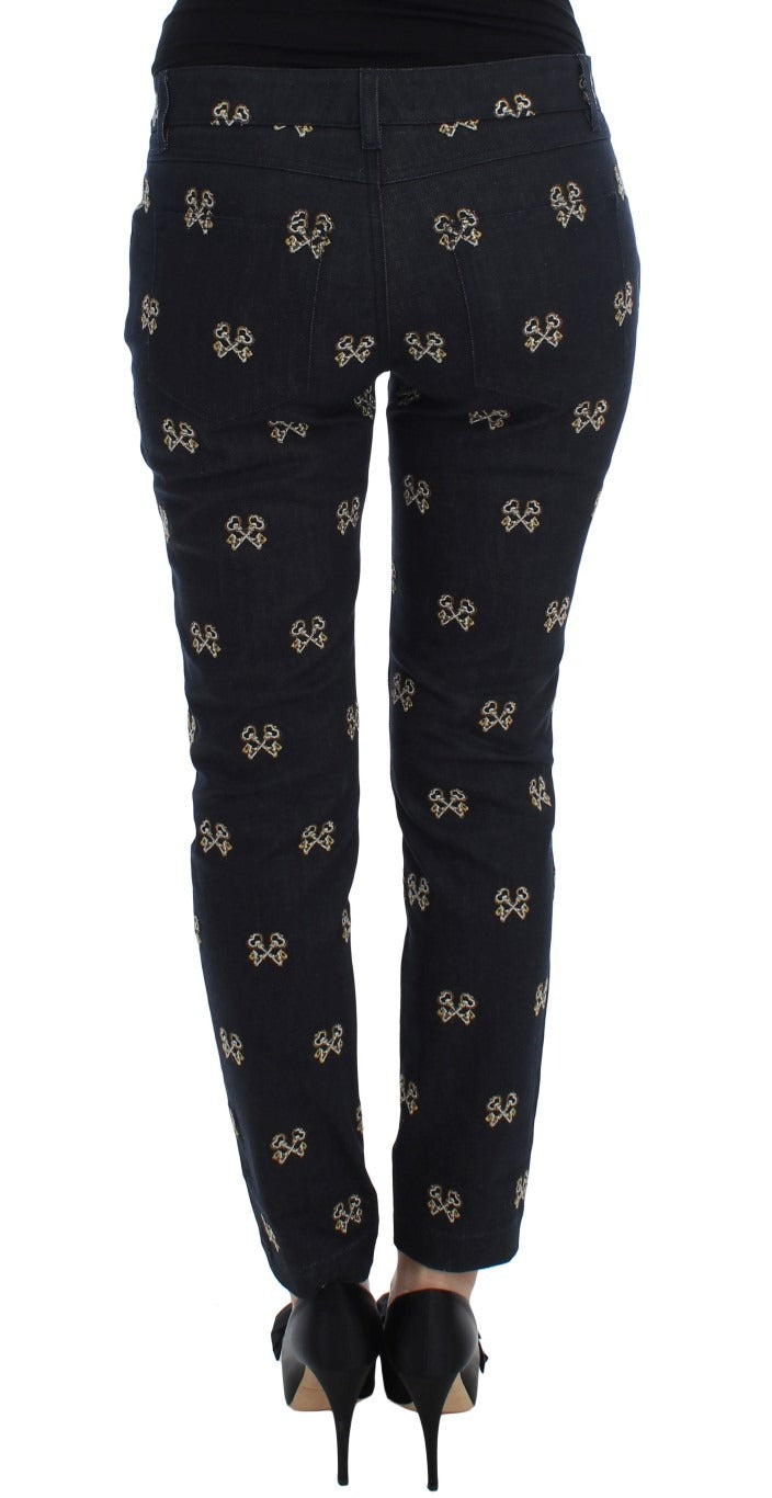 Blue slim fit KATE jeans from Dolce & Gabbana with embroidered key design on denim fabric.
