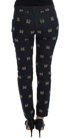 Blue slim fit KATE jeans from Dolce & Gabbana with embroidered key design on denim fabric.