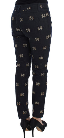 Blue Dolce & Gabbana Kate slim fit jeans with embroidered key designs, made from denim fabric.