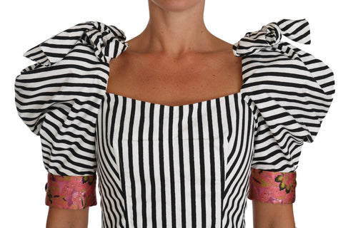 White and black striped cropped top with puff sleeves by Dolce & Gabbana, showcasing a stylish and trendy fashion piece.