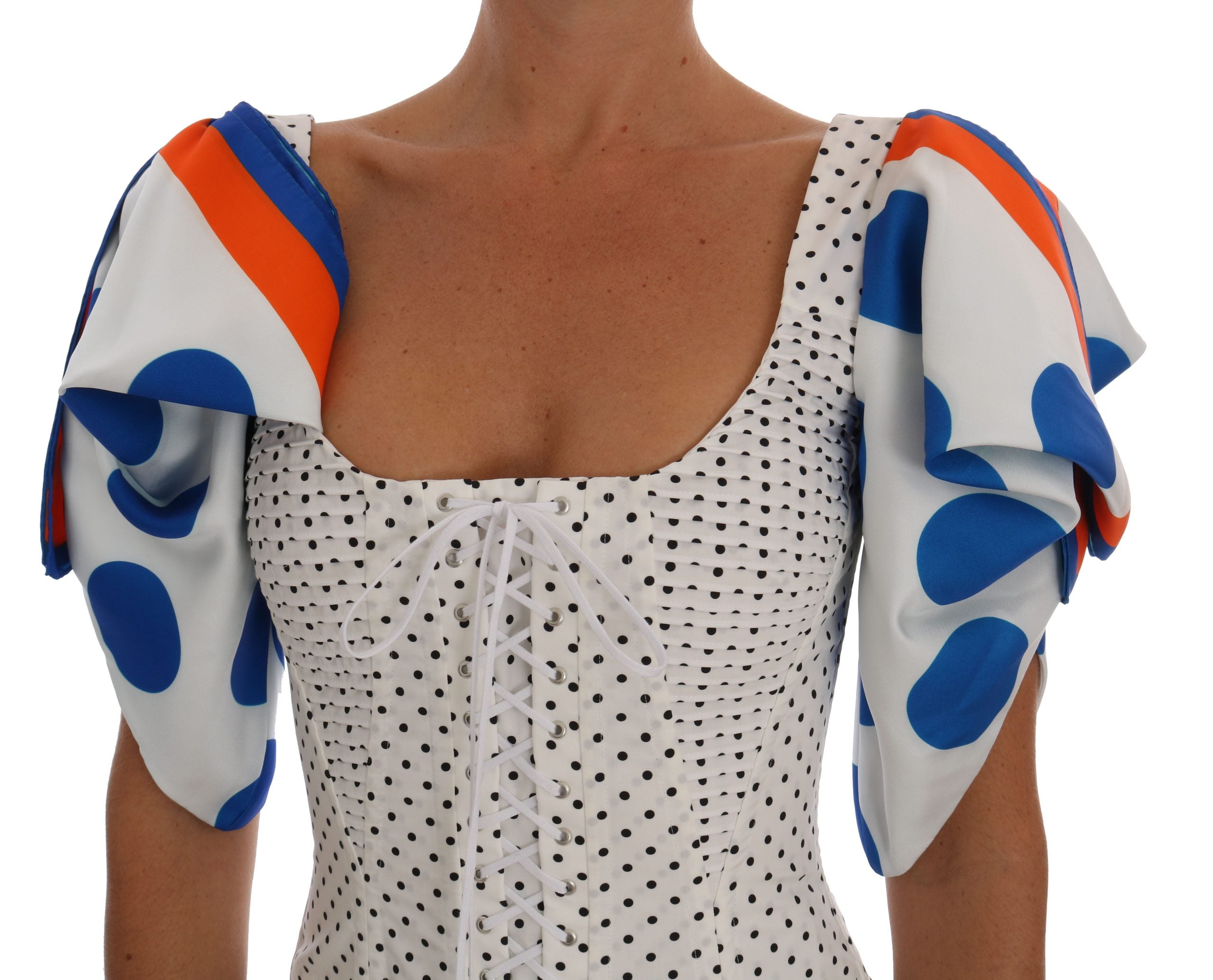 White polka dot silk corset bustier top by Dolce & Gabbana with structured fit and delicate bow detail.