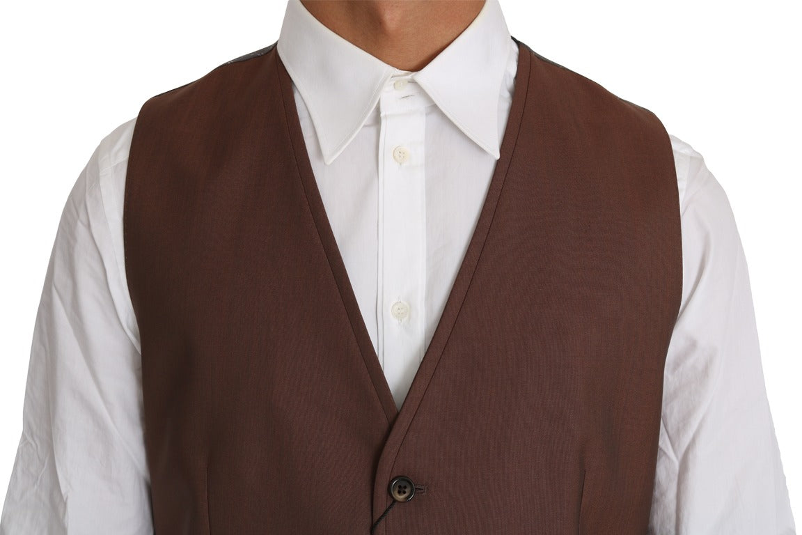 Brown wool silk waistcoat vest by Dolce & Gabbana, shown on a hanger with detailed fabric texture and tailored fit.