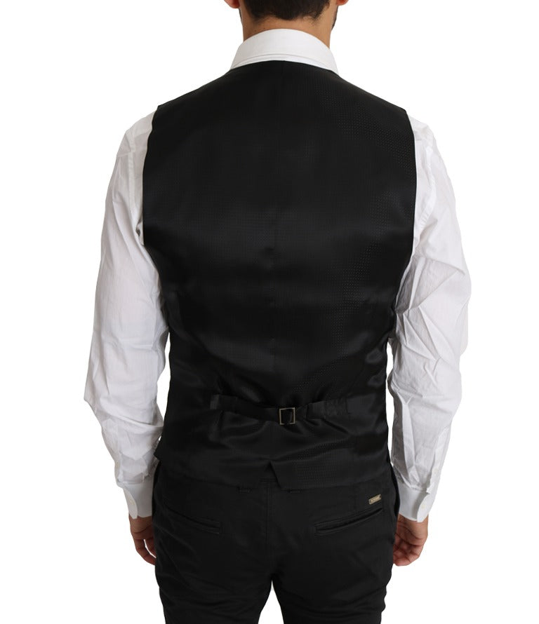 Black solid wool silk waistcoat vest by Dolce & Gabbana, featuring a tailored fit and classic design.