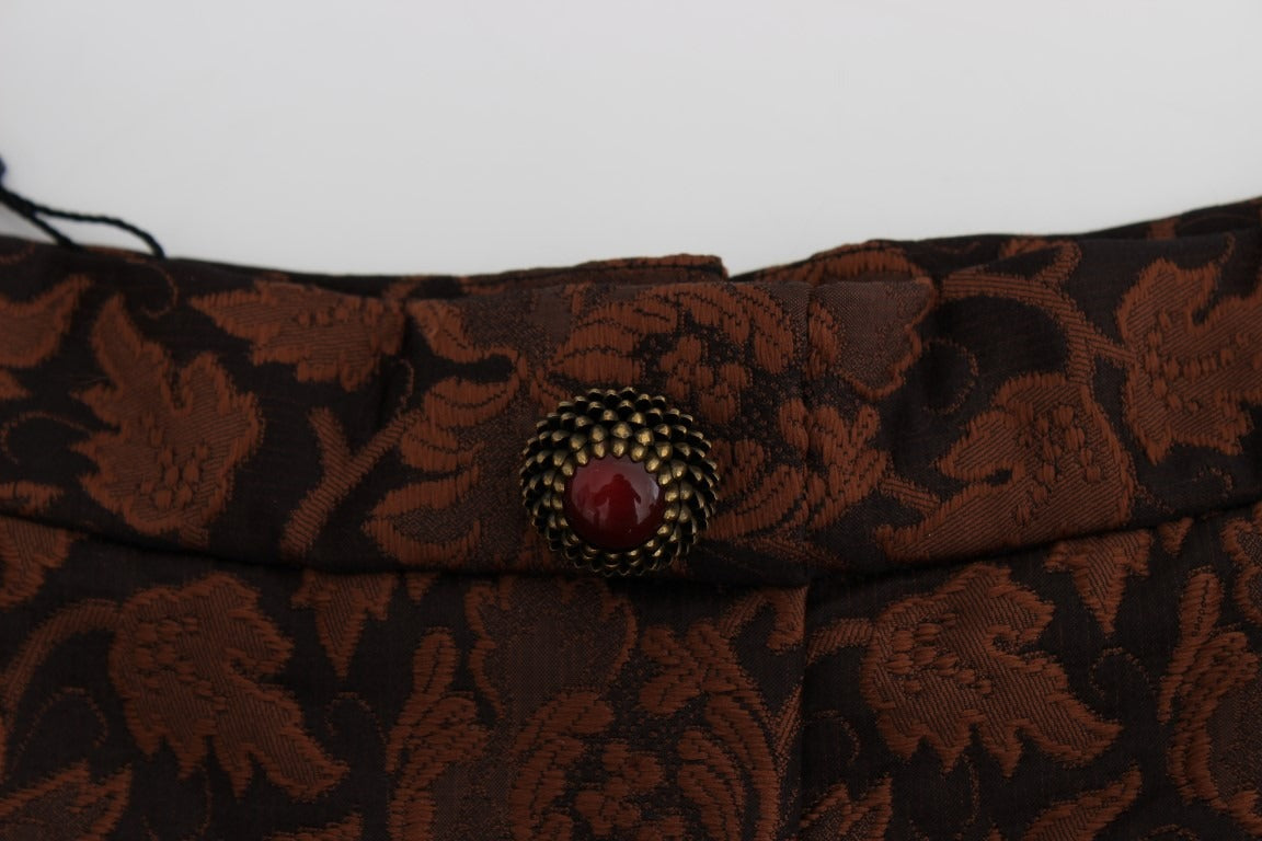 Brown floral brocade mini bubble skirt by Dolce & Gabbana shown with intricate floral patterns and a gathered bubble silhouette.
