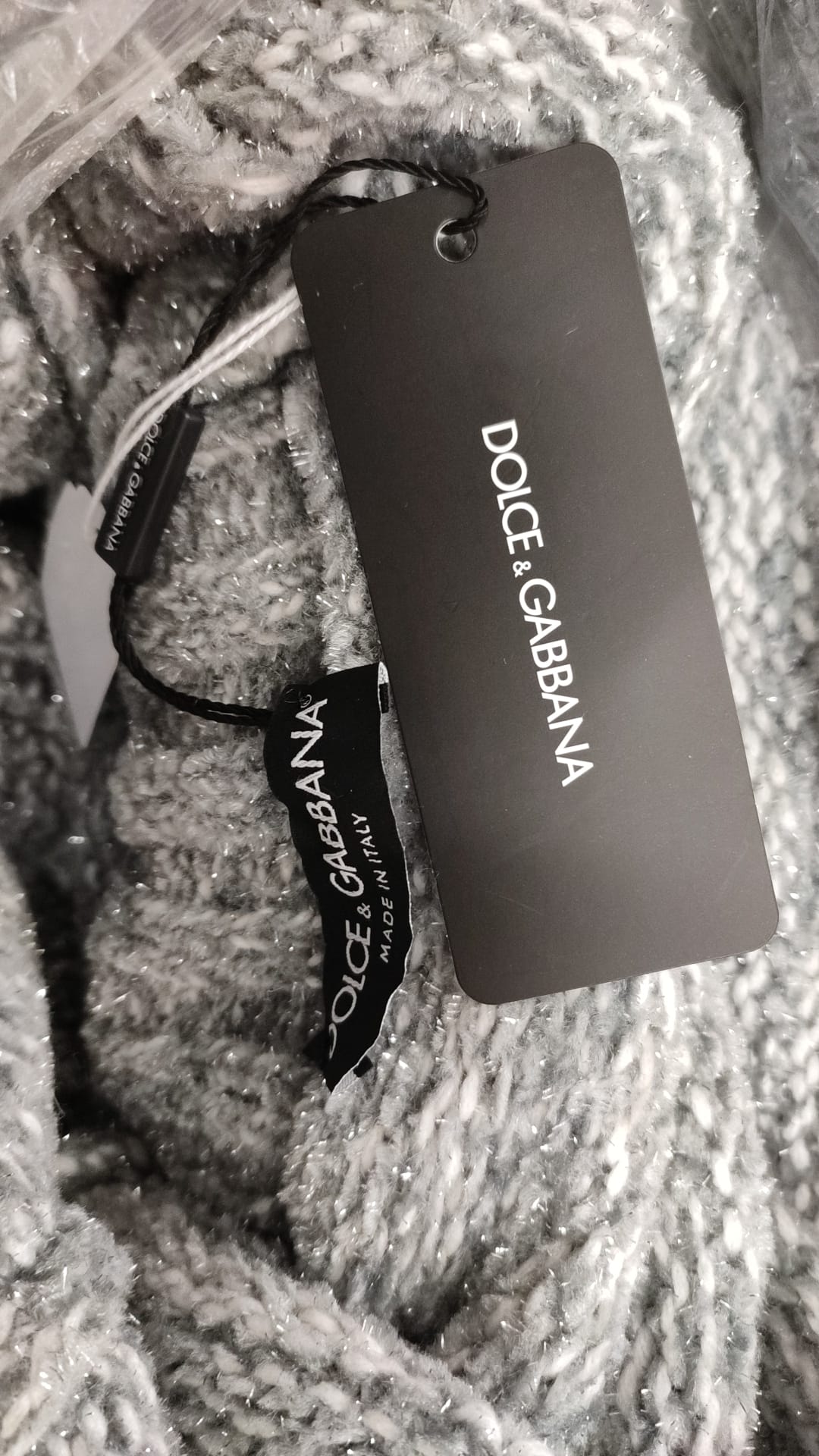 Gray cashmere turtle neck pullover sweater by Dolce & Gabbana, featuring a cozy, soft knit fabric and a classic turtleneck design.