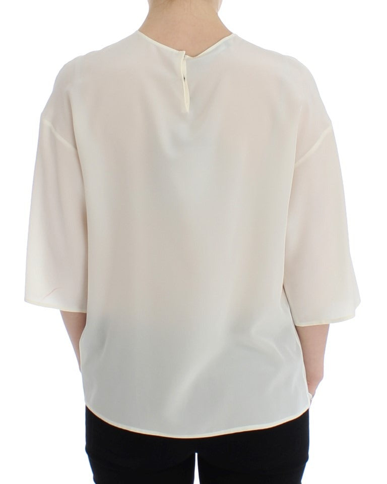 White sequined silk blouse T-shirt top by Dolce & Gabbana featuring shimmering sequins and a relaxed fit.