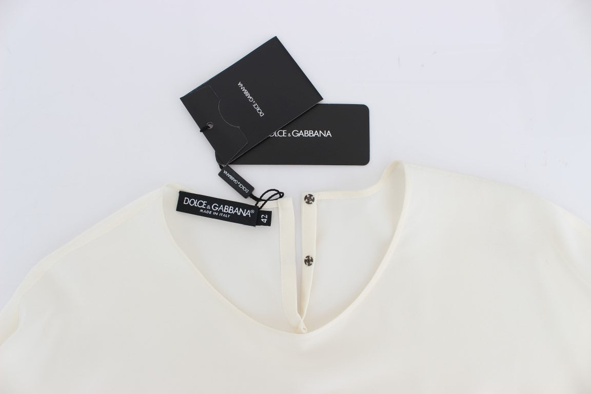 White sequined silk blouse T-shirt top by Dolce & Gabbana with a relaxed fit and elegant key design, perfect for stylish casual wear.