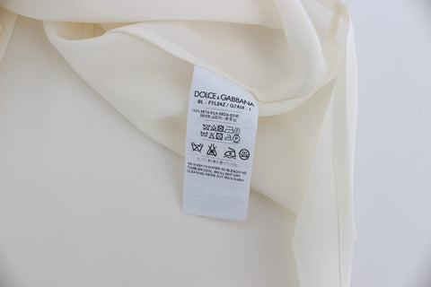White sequined silk blouse with key design by Dolce & Gabbana, styled as a chic T-shirt top with elegant detailing.