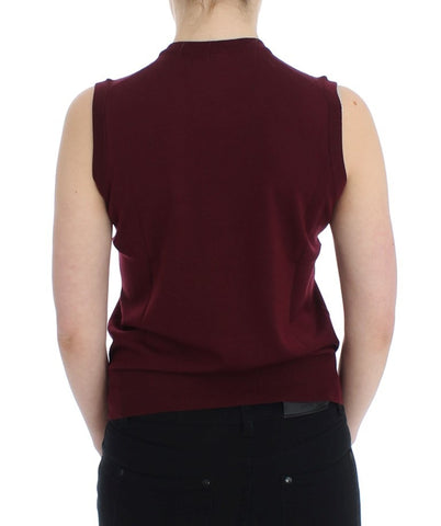 Red sleeveless crewneck vest pullover by Dolce & Gabbana, showing the front view with a fitted design and smooth fabric.