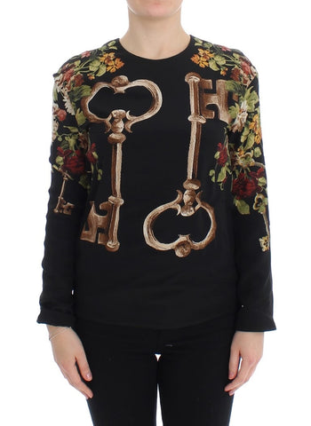 Black floral print silk blouse top by Dolce & Gabbana, featuring a stylish key pattern and elegant design.