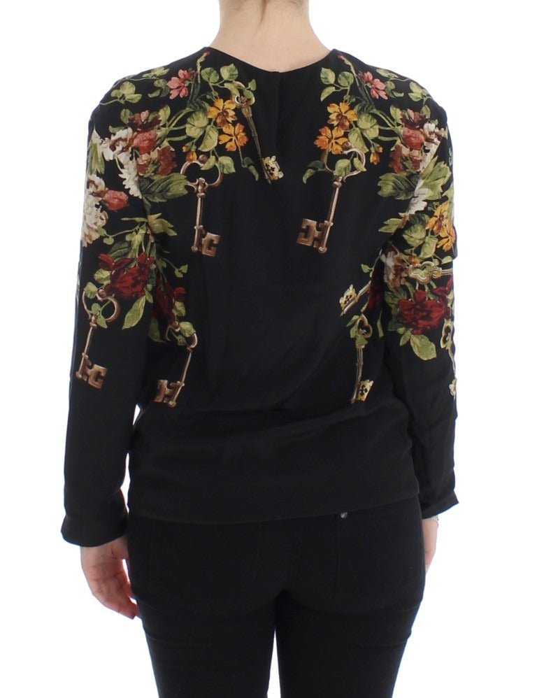 Black floral print silk blouse top by Dolce & Gabbana, featuring a stylish key pattern design and elegant long sleeves.