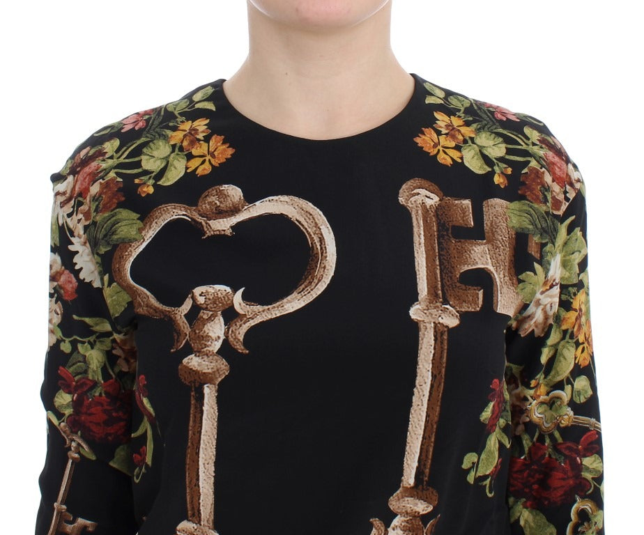 Black floral print silk blouse top by Dolce & Gabbana, featuring a stylish key pattern and elegant design.