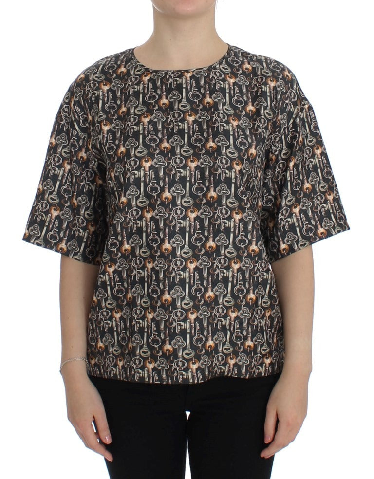 Gray silk blouse with gold key print from Dolce & Gabbana, featuring a stylish T-shirt design and elegant fabric details.