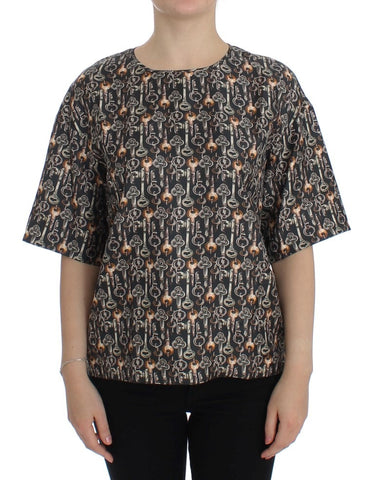 Gray silk blouse with gold key print from Dolce & Gabbana, featuring a stylish T-shirt design and elegant fabric details.