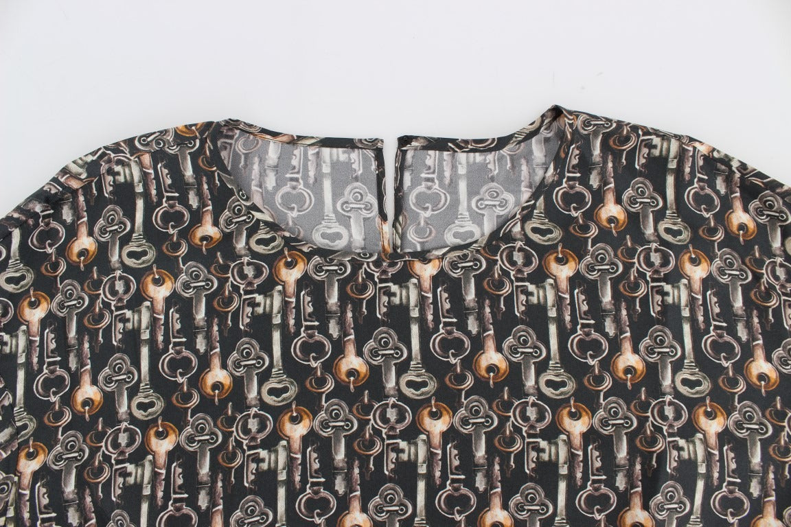 Gray silk blouse with gold key print from Dolce & Gabbana, featuring a stylish T-shirt design with a sleek, elegant look.