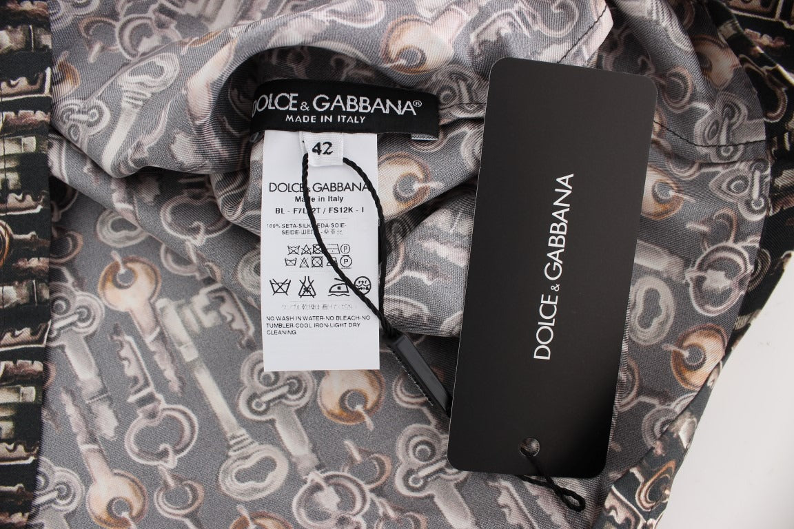 Gray silk blouse with gold key print from Dolce & Gabbana featuring a classic T-shirt style and elegant design.