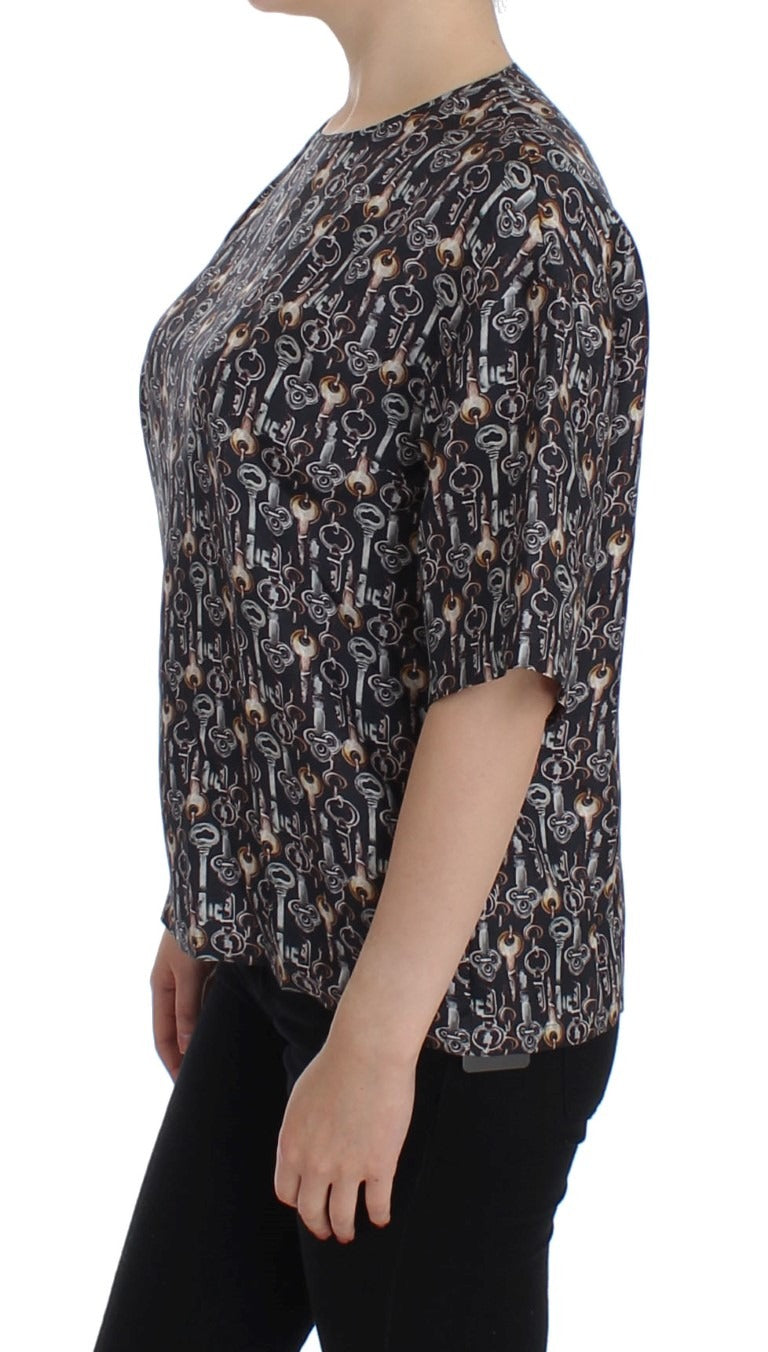 Gray silk blouse with gold key print from Dolce & Gabbana, featuring a T-shirt style with a relaxed fit and stylish design.