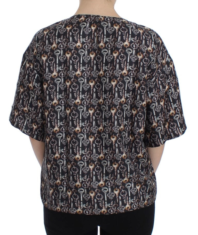 Gray silk blouse with gold key print from Dolce & Gabbana, featuring a stylish T-shirt design and elegant fabric details.