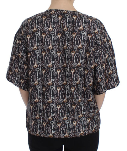 Gray silk blouse with gold key print from Dolce & Gabbana, featuring a stylish T-shirt design and elegant fabric details.