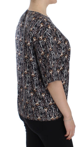 Gray silk blouse with gold key print from Dolce & Gabbana, featuring a classic T-shirt style and elegant design.